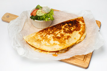 Tortilla with vegetables and cheese