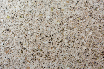 Background of small white and black rocks. Background and texture of small white and black rocks