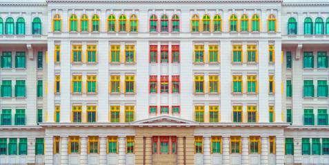 Colorful rainbow pastel building with facade windows background. Architecture building design in Former Hill Street Police Station near Clarke Quay, Singapore City.