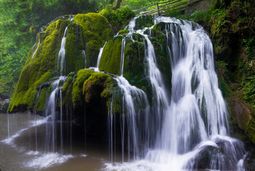 Fototapeta na wymiar One of the most beautiful waterfalls in Europe the Bigar waterfall. Amazing nature landscape.