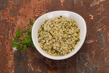 Peeled hemp seeds in the bowl