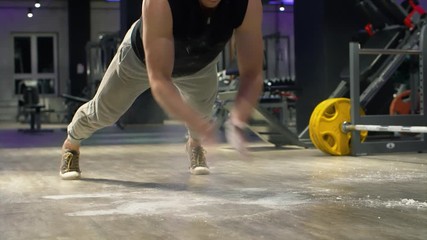 Athletic man doing push ups with clapping. Fitness, sport, exercising, training and lifestyle concept.