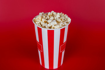 Top above high angle overhead close up view photo of tasty fresh delicious yummy sweet sugary salty popcorn isolated over bright shiny color background with copyspace