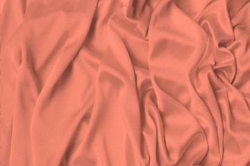 silk knitted fabric softly draped with small folds, texture, background, form for postcard, copy...