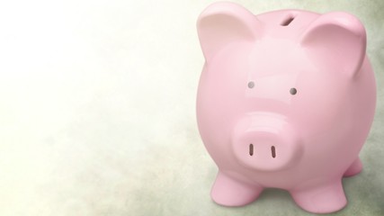 Pink piggy bank on  background