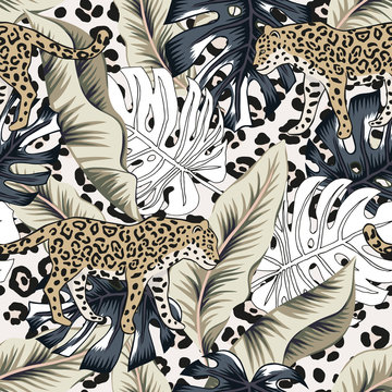Tropical leopard, banana, monstera palm leaves, animal print background. Vector seamless pattern. Graphic illustration. Exotic jungle plants. Summer beach floral design. Paradise nature