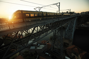 Douro river and Dom Luis I Bridge at sunset, Porto - Portugal.