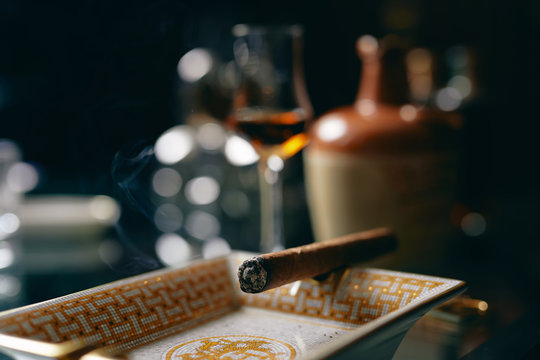 Cuban Cigar in ashtray.