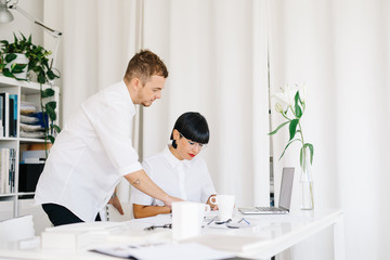 Stylish coworking designers in modern office