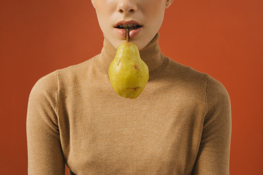 A Woman Posing With Fruit