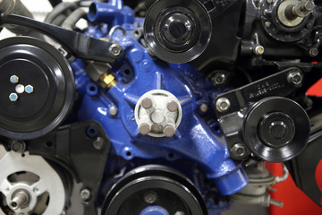 Obraz na płótnie Canvas An American V8 combustion engine on display at an automotive shop.