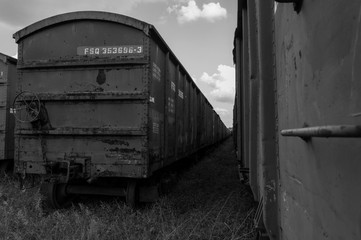 Fototapeta na wymiar Abandoned wagon on a train station