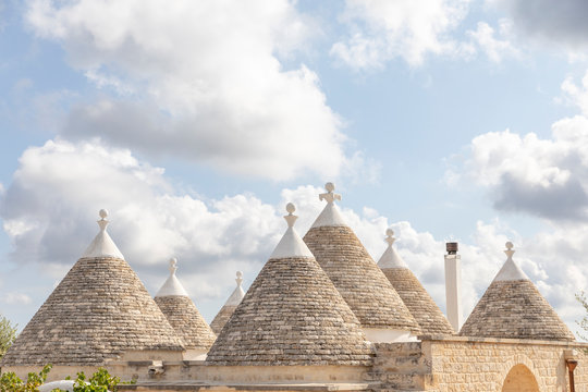 The cone-shaped roofs of the trulli, typical houses in Itria Valley