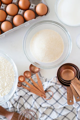 Baking Ingredients with Brown Eggs in Carton