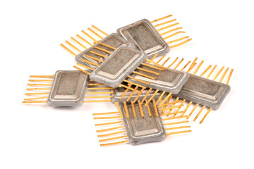 Old radio a component, an integrated chip in the metal case with the contacts covered with gold