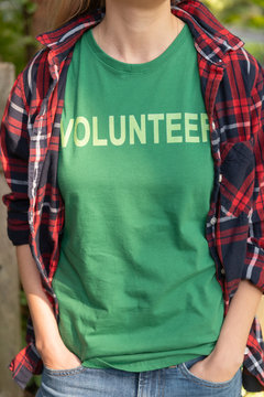 Woman in volunteer shirt