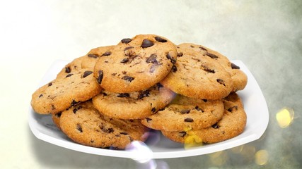 Plate of chocolate chip cookies isolated on white background