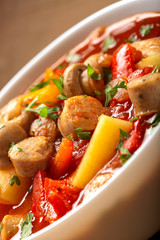 Stew or soup made from vegetables and german sausages