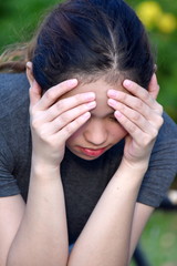 Worried Young Filipina Woman