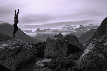 Man on top of mountain