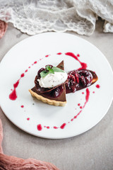 Chocolate Custard Tart Dessert with Concord Grape Compote and Vanilla Chantilly Cream