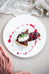 Chocolate Custard Tart Dessert with Concord Grape Compote and Vanilla Chantilly Cream