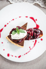 Chocolate Custard Tart Dessert with Concord Grape Compote and Vanilla Chantilly Cream