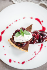 Chocolate Custard Tart Dessert with Concord Grape Compote and Vanilla Chantilly Cream