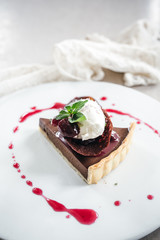 Chocolate Custard Tart Dessert with Concord Grape Compote and Vanilla Chantilly Cream