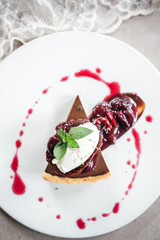Chocolate Custard Tart Dessert with Concord Grape Compote and Vanilla Chantilly Cream
