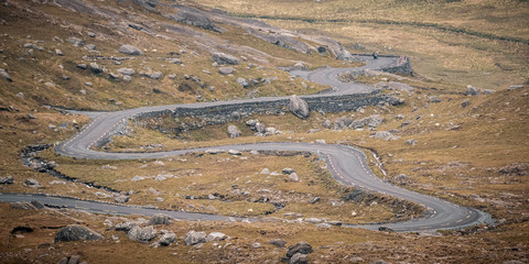 Motorcyclist descends Healy Pass in Ireland