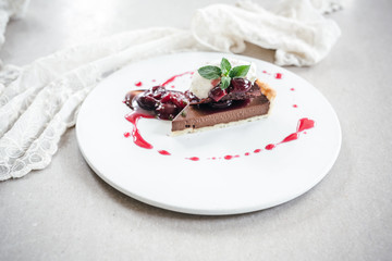 Chocolate Custard Tart Dessert with Concord Grape Compote and Vanilla Chantilly Cream