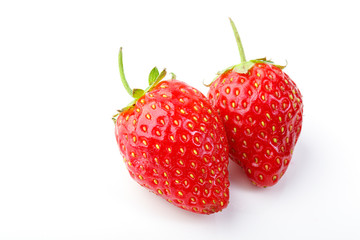 beautiful and ripe red strawberries on a white background