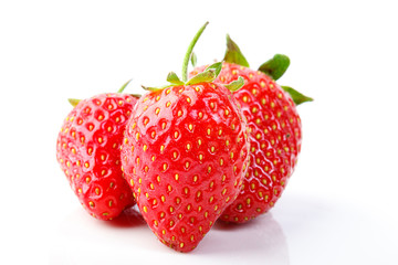 beautiful and ripe red strawberries on a white background