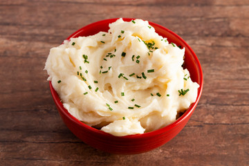 Bowl of Creamy Mashed Potatoes with Chives on Top