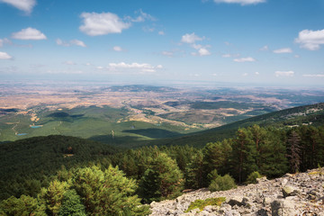Fototapeta na wymiar View of green valleys of Aragon region from the moncayo mountain. Natural environment in summer season .