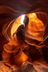 Red and purple cave in the Upper Antelope Canyon in the town of Page, Arizona. United States, vertical photo