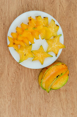 Carambola Fruits In Plate Below 