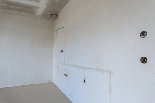 Interior empty apartment room n a new building renovation or under construction