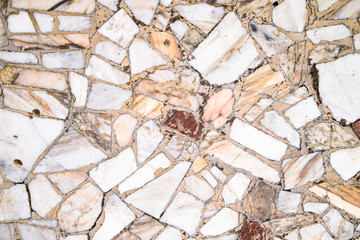 Texture background of stone floor. Pieces of marble in cement.
