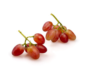 Ripe pink grapes. Two clusters of ripened berries.