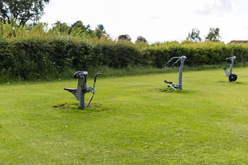 Outdoor fitness equipment found in a public park for all ages to use for free
