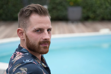 a red beard young male model portrait