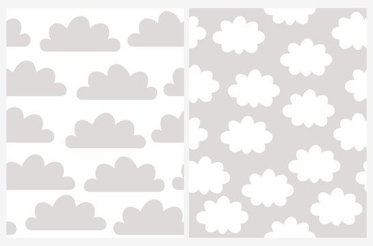 Simple Cloudy Vector Patterns. Cute Gray Clouds Isolated on a White Background. White Fluffy Clouds on a Light Gray Sky. Gender Neutral Colors.