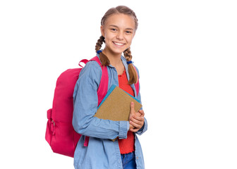 Beautiful student teen girl with backpack holding books, looking at camera. Portrait of cute smiling schoolgirl with bag, isolated on white background. Happy child Back to school. - 285348733