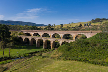 An old train viaduct bridge in the countryside