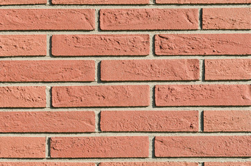 Red rustic brick wall texture background 
