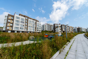 Fototapeta premium A new residential neighborhood in the city by the sea. New buildings of the residential district.