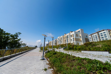 Fototapeta na wymiar A new residential neighborhood in the city by the sea. New buildings of the residential district.