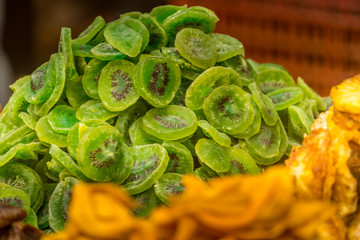 Dried green sweet kiwi on display at a Middle Eastern food market
